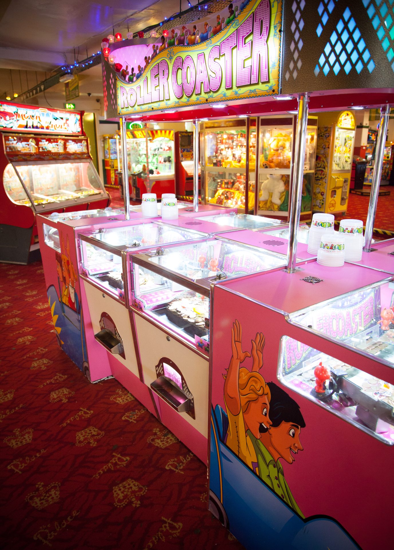 Traditional seaside arcade coin pusher